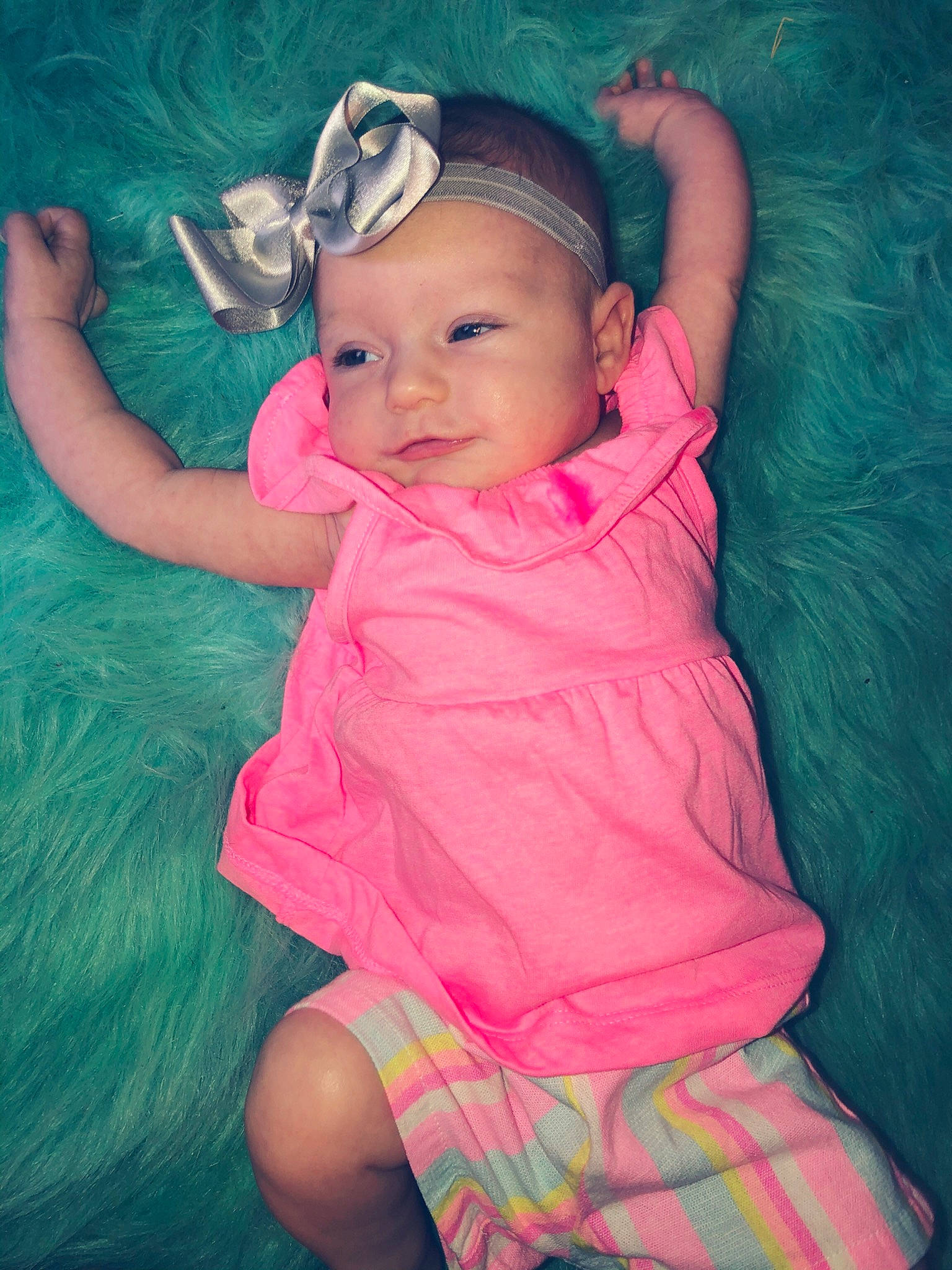 Kynsleigh is registered to the contest to win money with this photo: baby, baby_toddler_clothing, beauty, cheek, child, eye, face, forehead, fun, green, hair_accessory, happy, head, headwear, iris, lip, neck, person, pink, skin