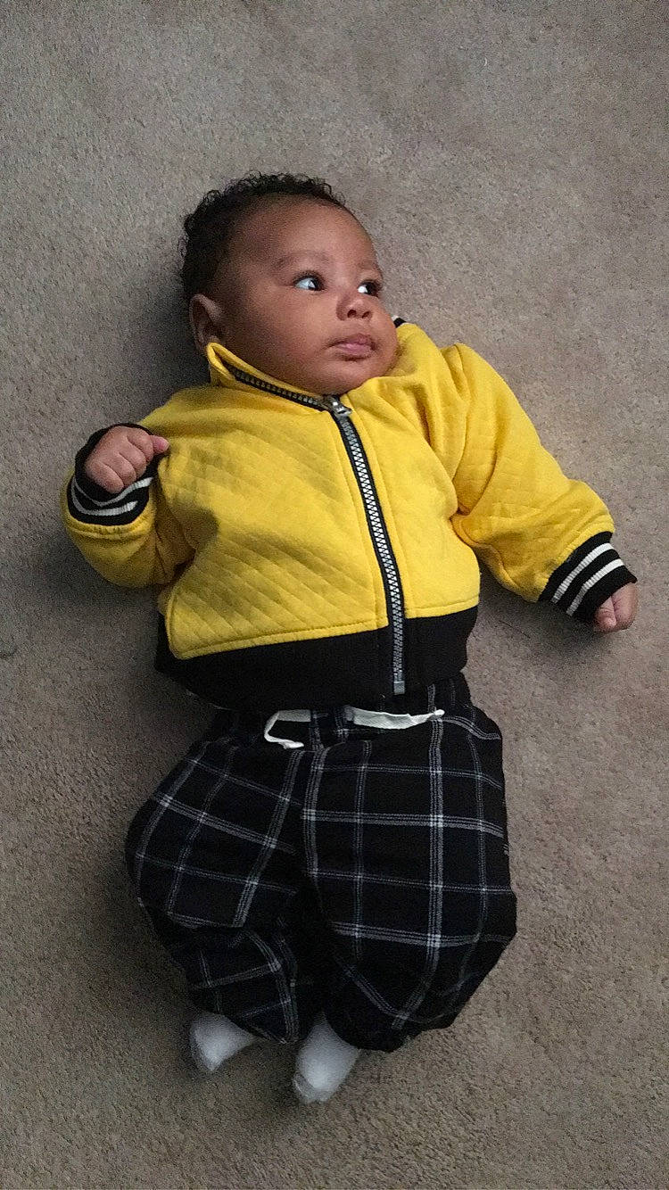 Konnor joined the competition — help win amazing prizes! child, design, outerwear, pattern, person, plaid, standing, tartan, toddler, yellow