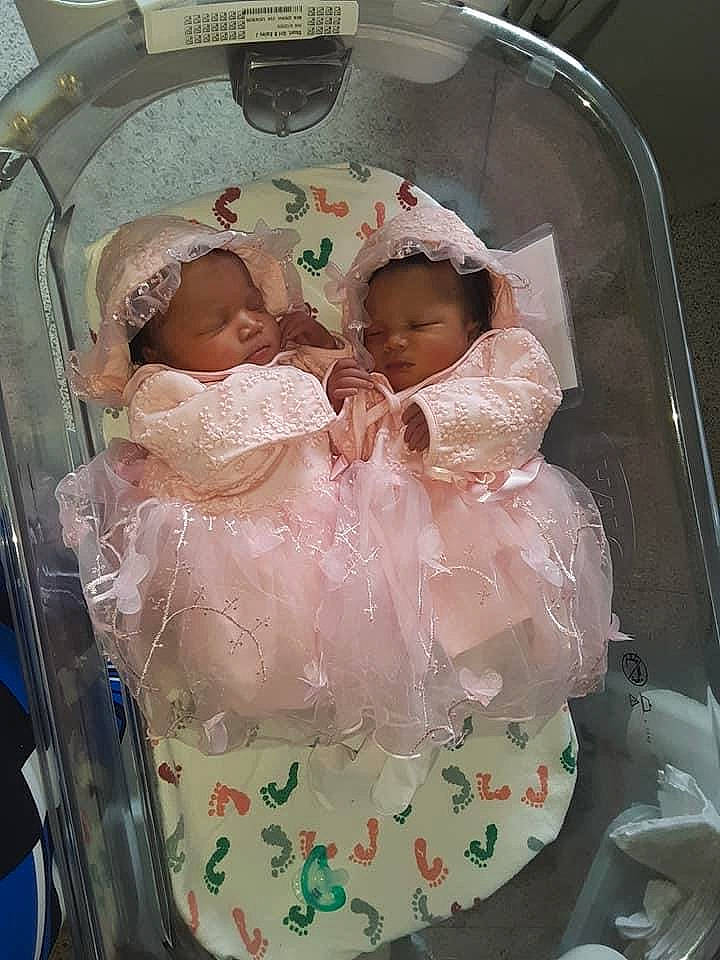 Sylvia is registered to the contest to win money with this photo: baby, baby_products, baby_toddler_clothing, child, comfort, dress, embellishment, event, facial_expression, fashion_accessory, fun, headgear, human_body, infant_bed, iris, jewellery, peach, person, pink, skin