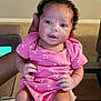 Elizabeth is registered to the contest to win money with this photo: accessories, baby, babylaughing, chair, clothing, couch, cushion, face, furniture, happy, head, homedecor, indoors, jewelry, necklace, person, photography, portrait, sitting, t_shirt