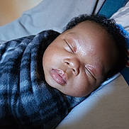 Elizabeth is registered to the contest to win money with this photo: baby, blanket, crying, cushion, face, head, homedecor, newborn, person, photography, portrait, sad, skin, sleeping, yawning