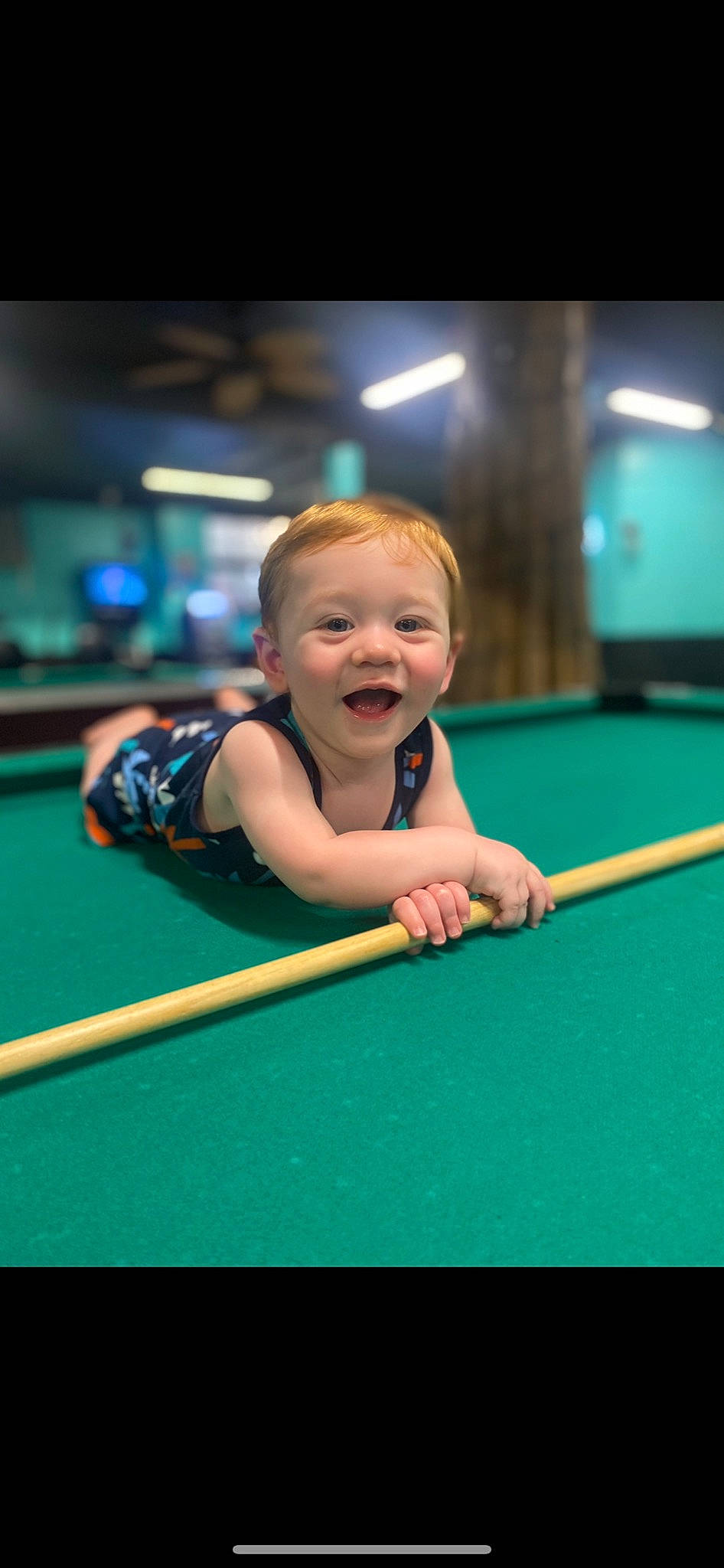 Corbett is registered to the contest to win money with this photo: arm, baize, billiard_ball, billiard_room, billiard_table, billiards, clothing, cue_stick, leisure, muscle, person, pocket_billiards, pool, pool_player, precision_sports, recreation_room, smile, sports, sports_equipment, straight_pool
