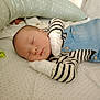 baby, newborn, sleeping, striped_clothing, mittens, overalls, crib, pillow, blanket, soft, infant, peaceful, resting, cute, face, head, child, person, sleep, comfortable