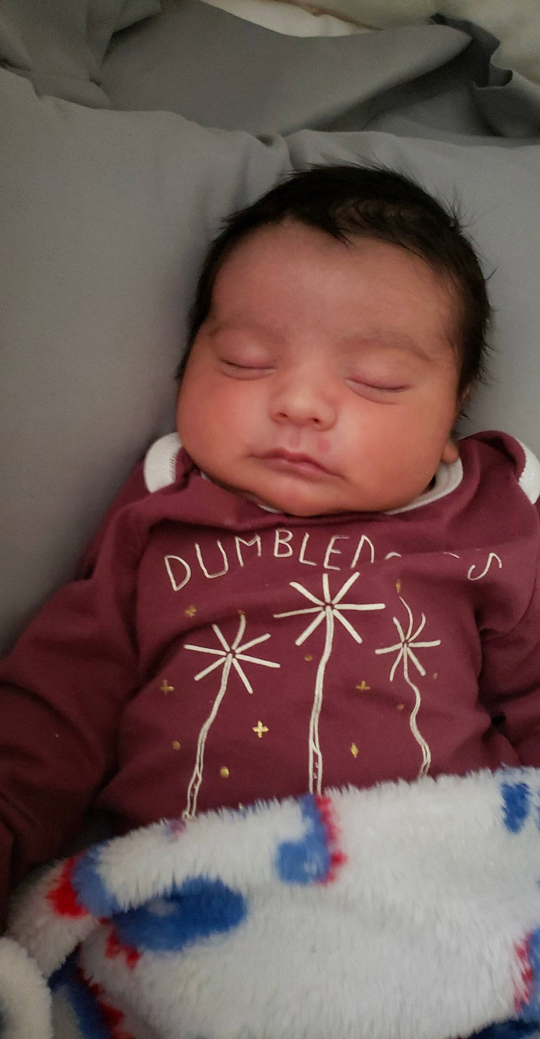 Draco is registered to the contest to win money with this photo: baby, bedtime, cheek, child, face, forehead, head, lip, mouth, nose, person, pink, skin, sleep, smile, textile, toddler