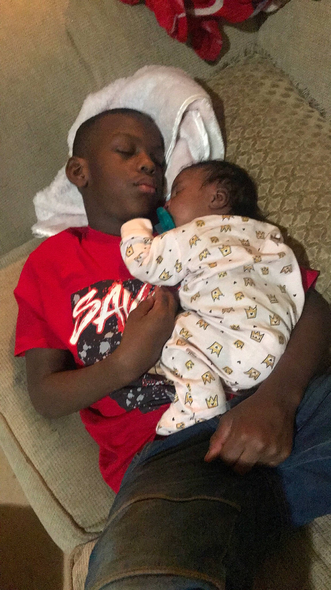 Quayé joined the competition — help win amazing prizes! abdomen, baby, child, comfort, elbow, event, gesture, happy, hug, human, interaction, joint, linens, mammal, person, sitting, skin, t_shirt, thigh, toddler