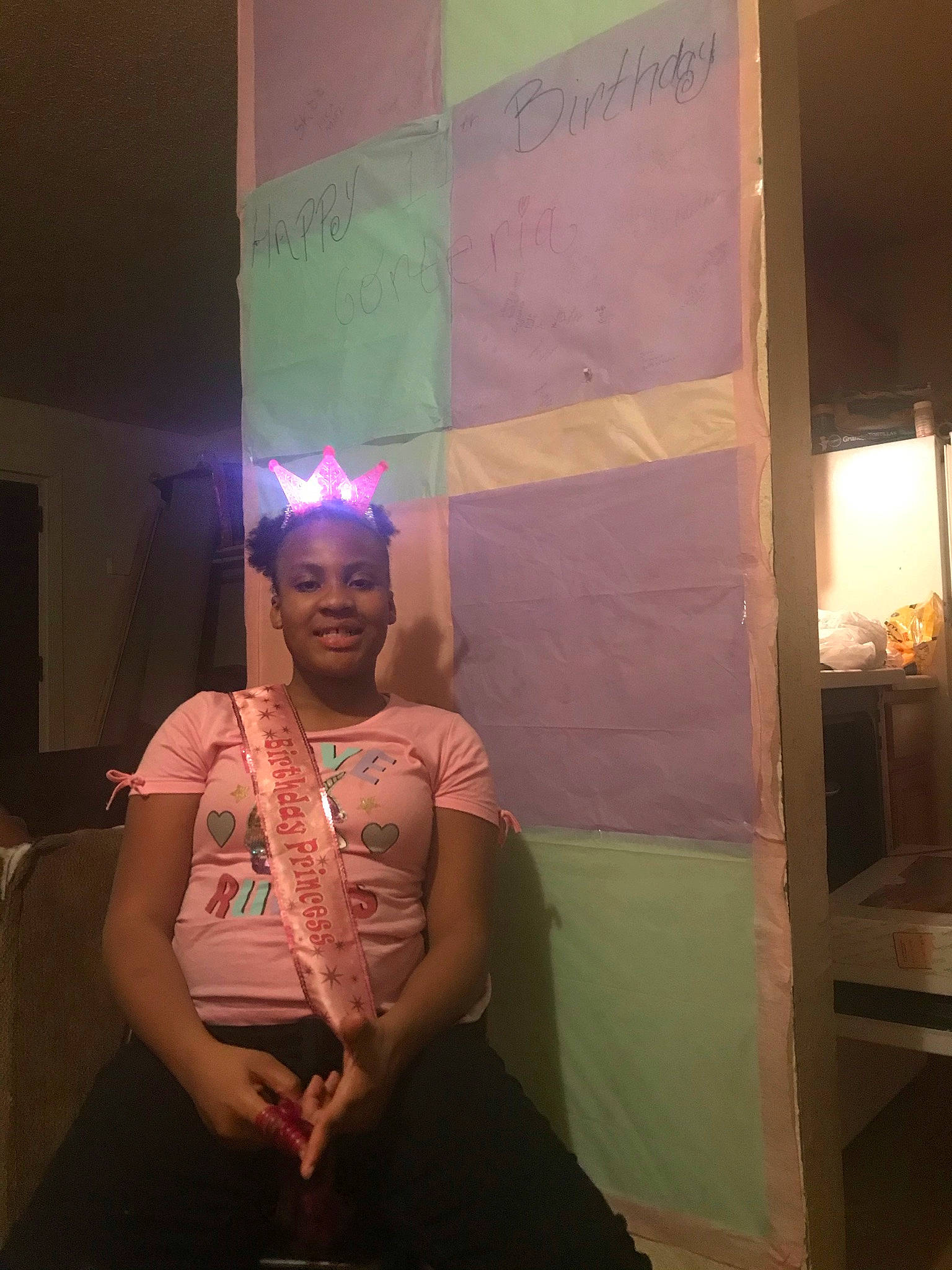 Corteria is registered to the contest to win money with this photo: art, artist, darkness, entertainment, event, fashion_design, flash_photography, fun, hat, jewellery, joy, magenta, necklace, performance, performance_art, performing_arts, person, purple, room, sitting