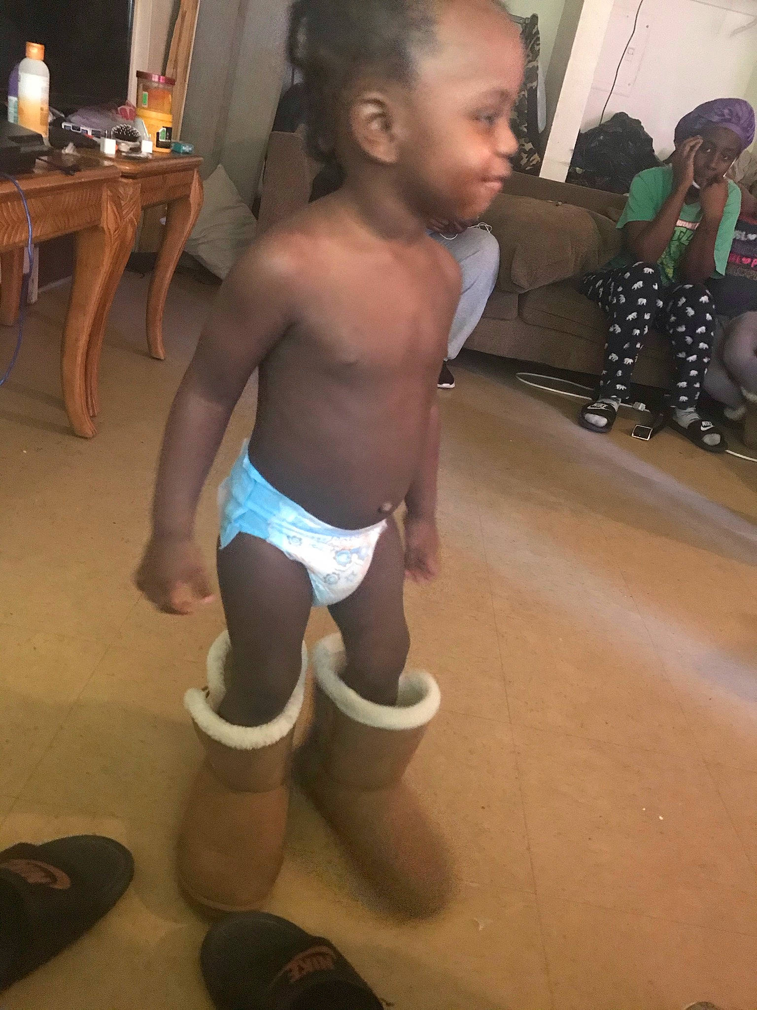 Charles joined the competition — help win amazing prizes! abdomen, barechested, barefoot, black, chest, event, flooring, fun, human_leg, joint, knee, leisure, person, shorts, standing, table, thigh, toddler, trunk, undergarment