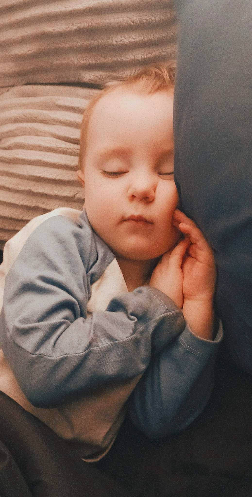 Stiles is registered to the contest to win money with this photo: baby, baby_toddler_clothing, cheek, child, comfort, elbow, eyebrow, eyelash, finger, gesture, hand, happy, nail, nose, person, sitting, sleeve, thumb, toddler, wood