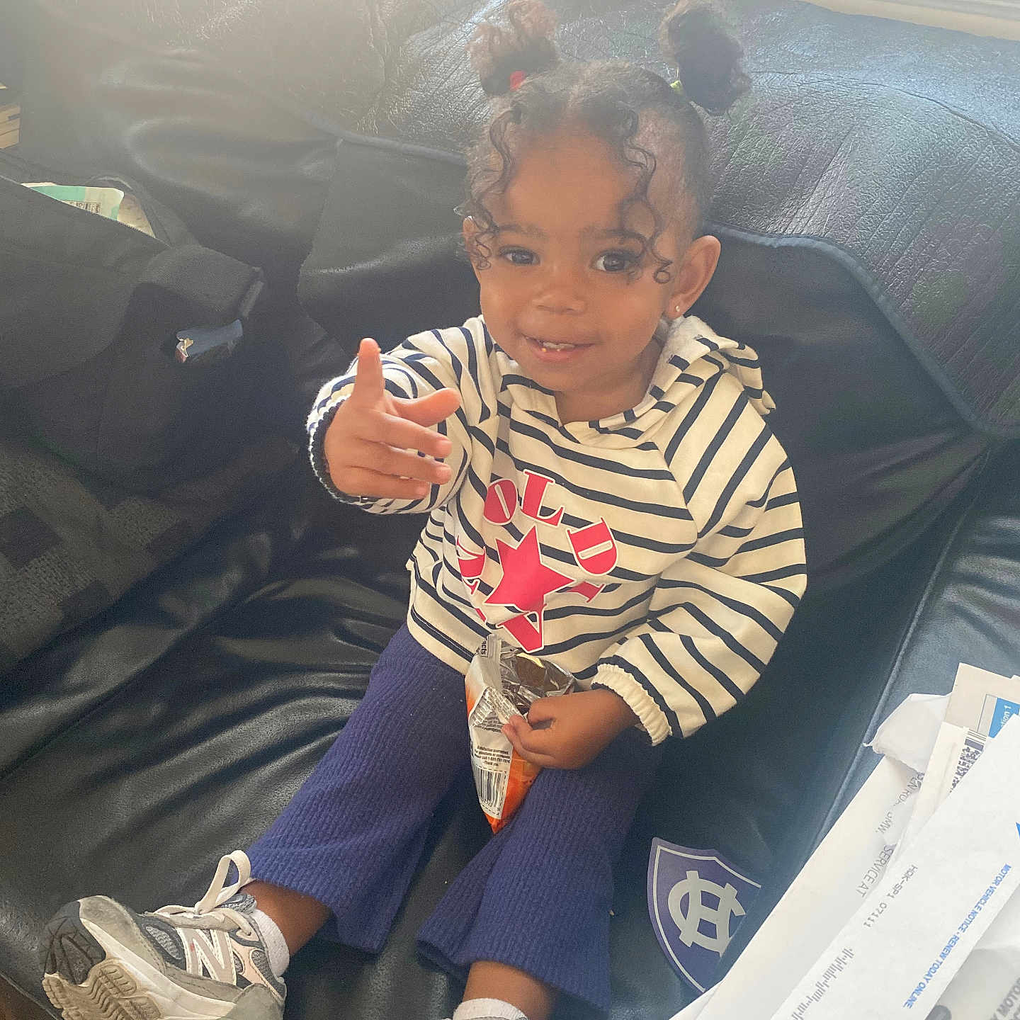 Brielle Mi'Ori joined the competition — help win amazing prizes! ball, child, clothing, couch, face, female, football, footwear, furniture, girl, head, pants, person, photography, portrait, shoe, sitting, sneaker, soccer, t_shirt