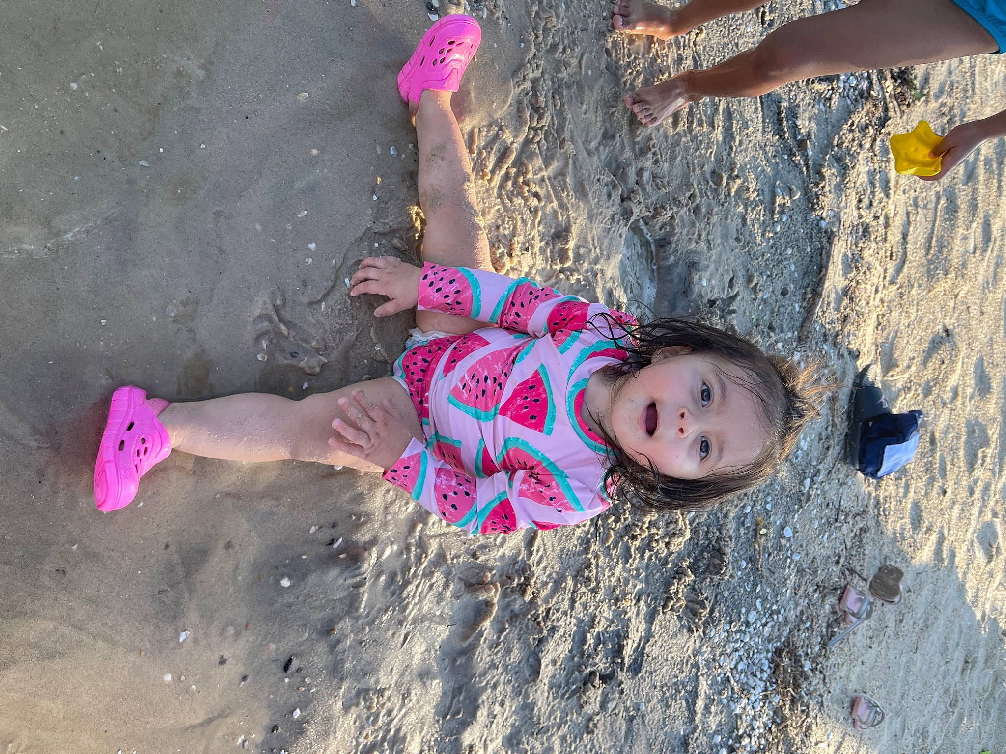 Analucia joined the competition — help win amazing prizes! barefoot, beach, child, foot, fun, grass, hand, happy, human_leg, leg, leisure, people_in_nature, person, pink, recreation, sand, shorts, summer, thigh, toddler
