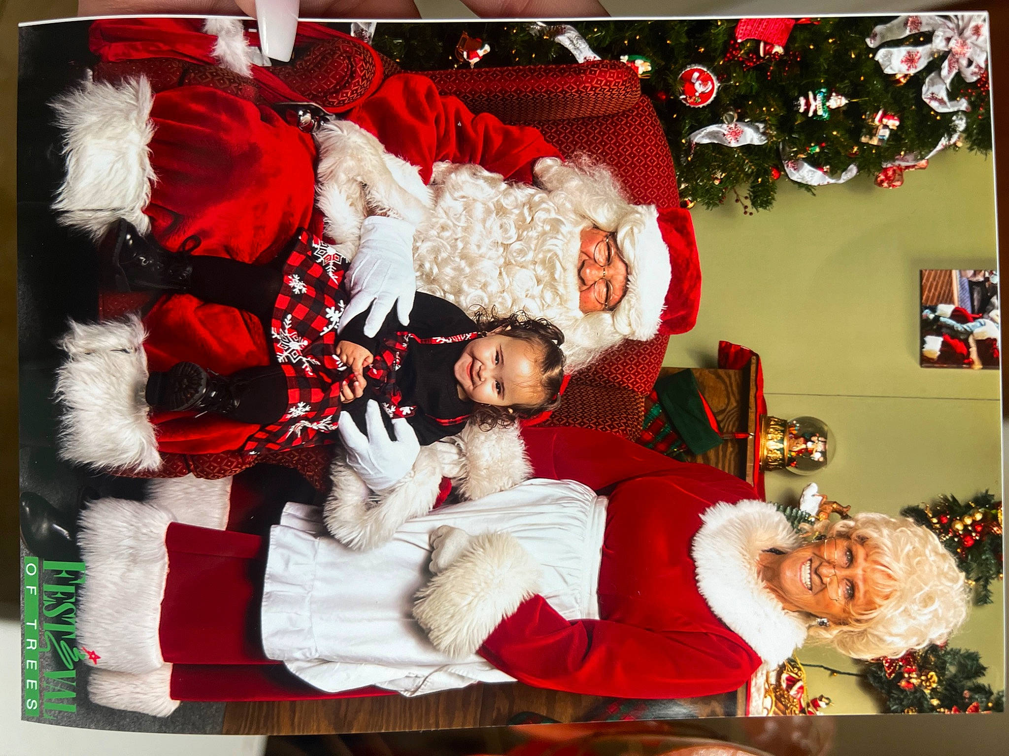 Ariyah is registered to the contest to win money with this photo: carmine, christmas, christmas_decoration, christmas_eve, christmas_ornament, christmas_tree, decoration, event, fictional_character, happy, headwear, holiday, holiday_ornament, interior_design, joy, lap, ornament, person, photograph, red