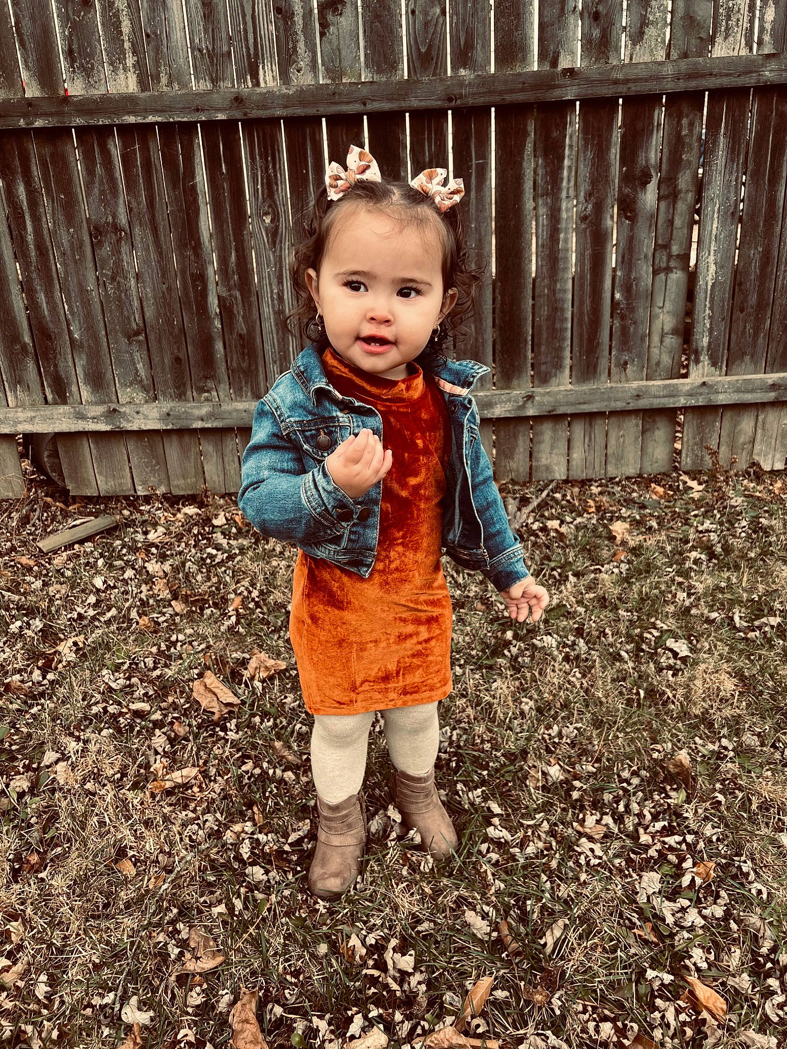 Ariyah joined the competition — help win amazing prizes! baby, baby_toddler_clothing, child, clothing, deciduous, fence, grass, happy, pattern, people, people_in_nature, person, pumpkin, sitting, sleeve, soil, spring, tints_and_shades, toddler, winter