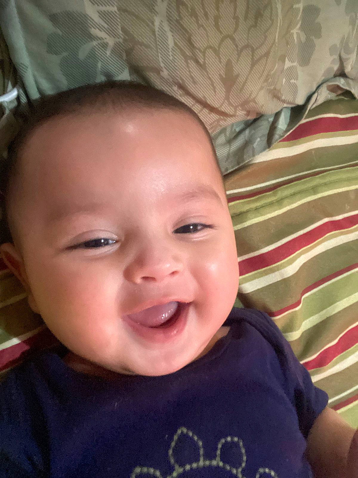 Emiliano is registered to the contest to win money with this photo: baby, baby_toddler_clothing, cheek, chin, comfort, cool, eyebrow, eyelash, forehead, happy, iris, lip, mouth, nose, person, skin, sleeve, smile, textile, toddler