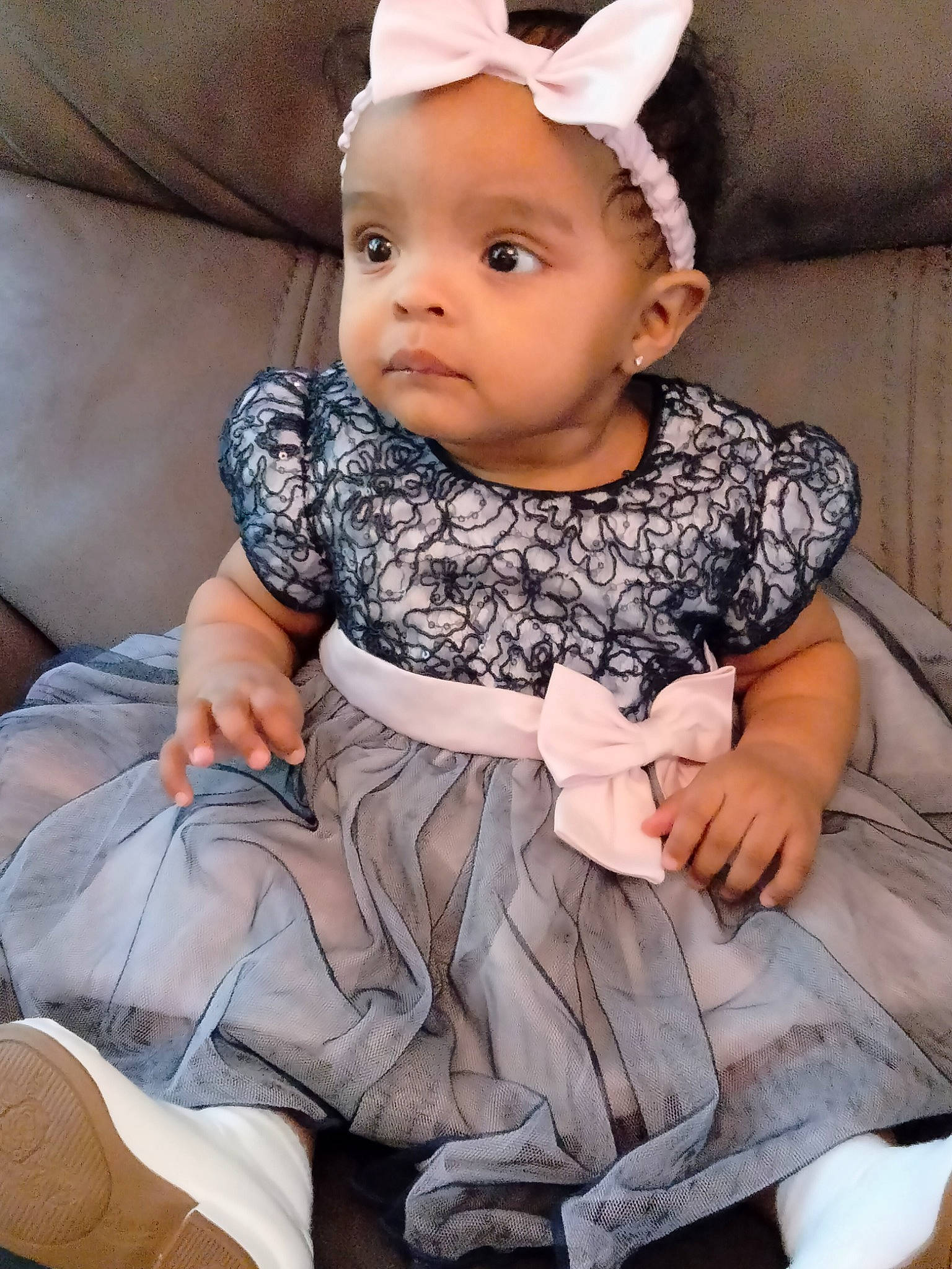 Alicia is registered to the contest to win money with this photo: baby, baby_toddler_clothing, cap, chair, cheek, child, comfort, costume_hat, dress, fashion_accessory, happy, headband, headwear, jewellery, pattern, person, pink, sitting, skin, sleeve