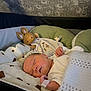 Richard a rejoint le concours — aidez-le/la à gagner de superbes lots ! newborn, baby, sleeping, blanket, plush_toy, bunny, pillow, bed, cozy, soft, infant, hospital_band, peaceful, indoors, portrait, resting, child, cute, warm, nursery