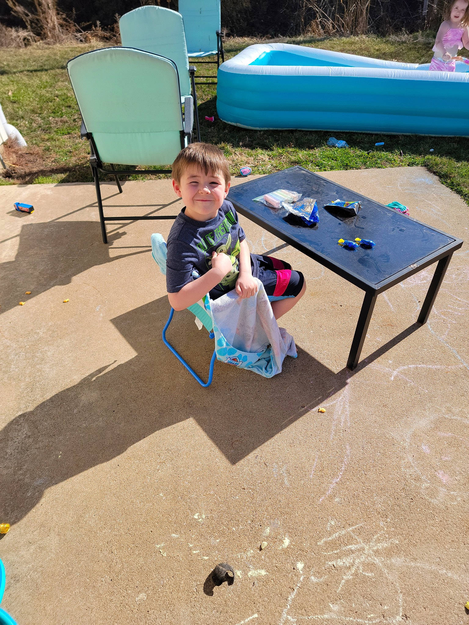 Lucas joined the competition — help win amazing prizes! chair, child, child_art, flooring, fun, furniture, games, grass, joy, leisure, outdoor_furniture, outdoor_table, person, play, recreation, sharing, shorts, sitting, table, toddler