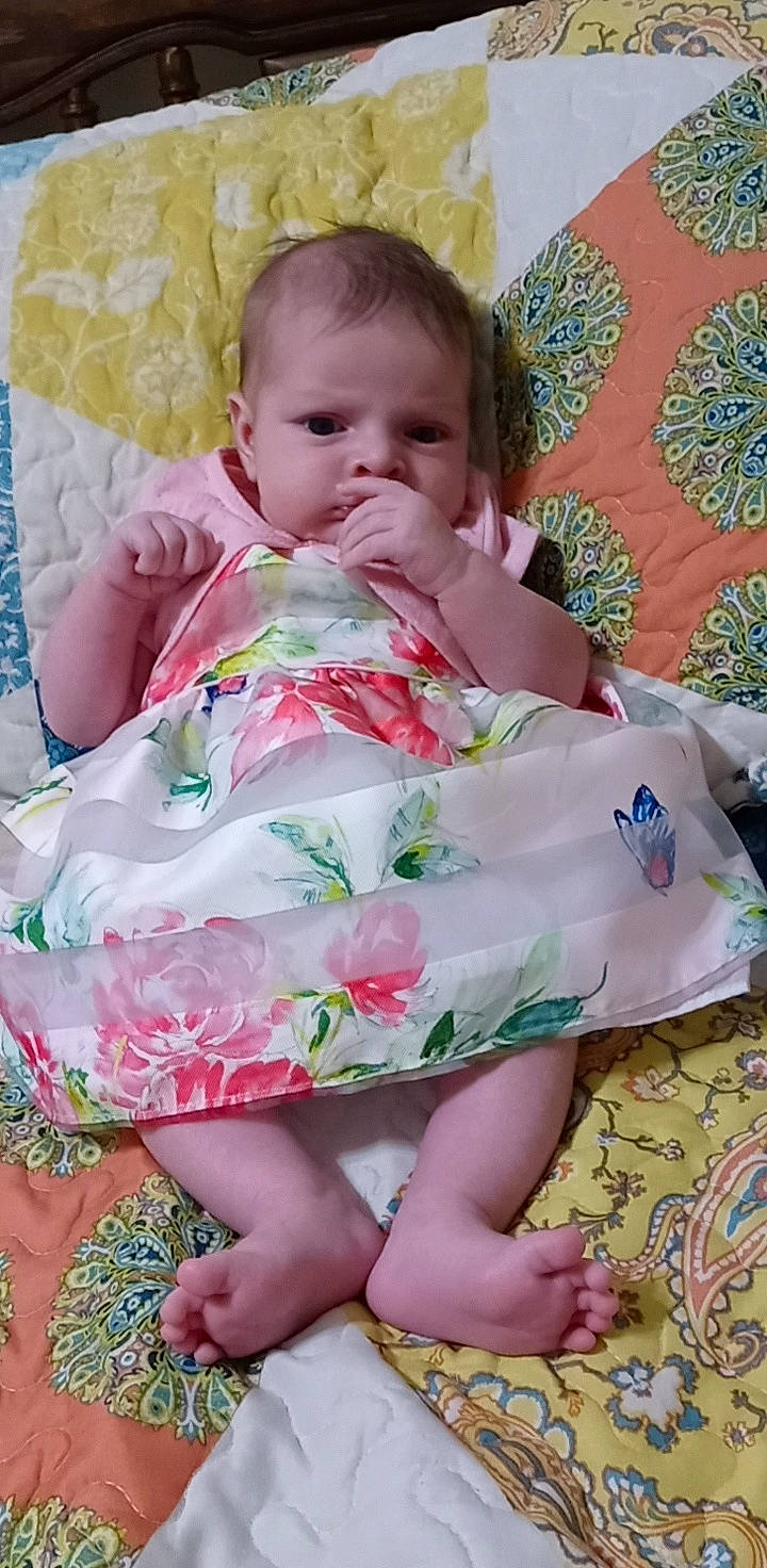 Makenna joined the competition — help win amazing prizes! baby, baby_toddler_clothing, cheek, child, comfort, grass, green, happy, head, iris, linens, pattern, person, pink, sitting, skin, sleeve, t_shirt, textile, thigh