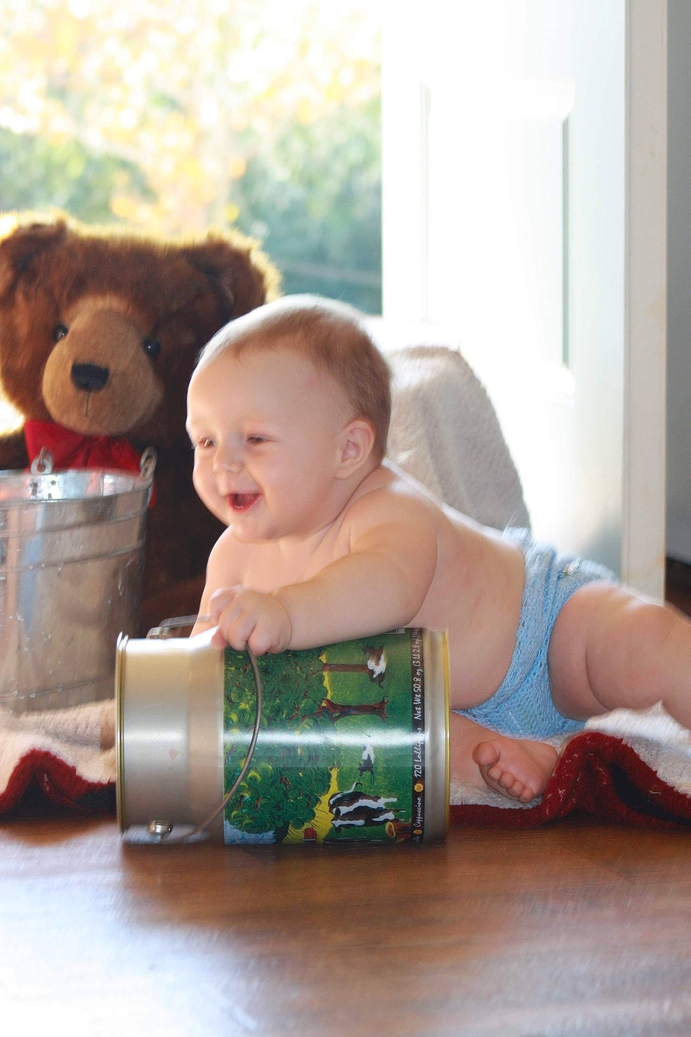 Savanna is registered to the contest to win money with this photo: arm, baby, child, ear, person, play, toddler, toy