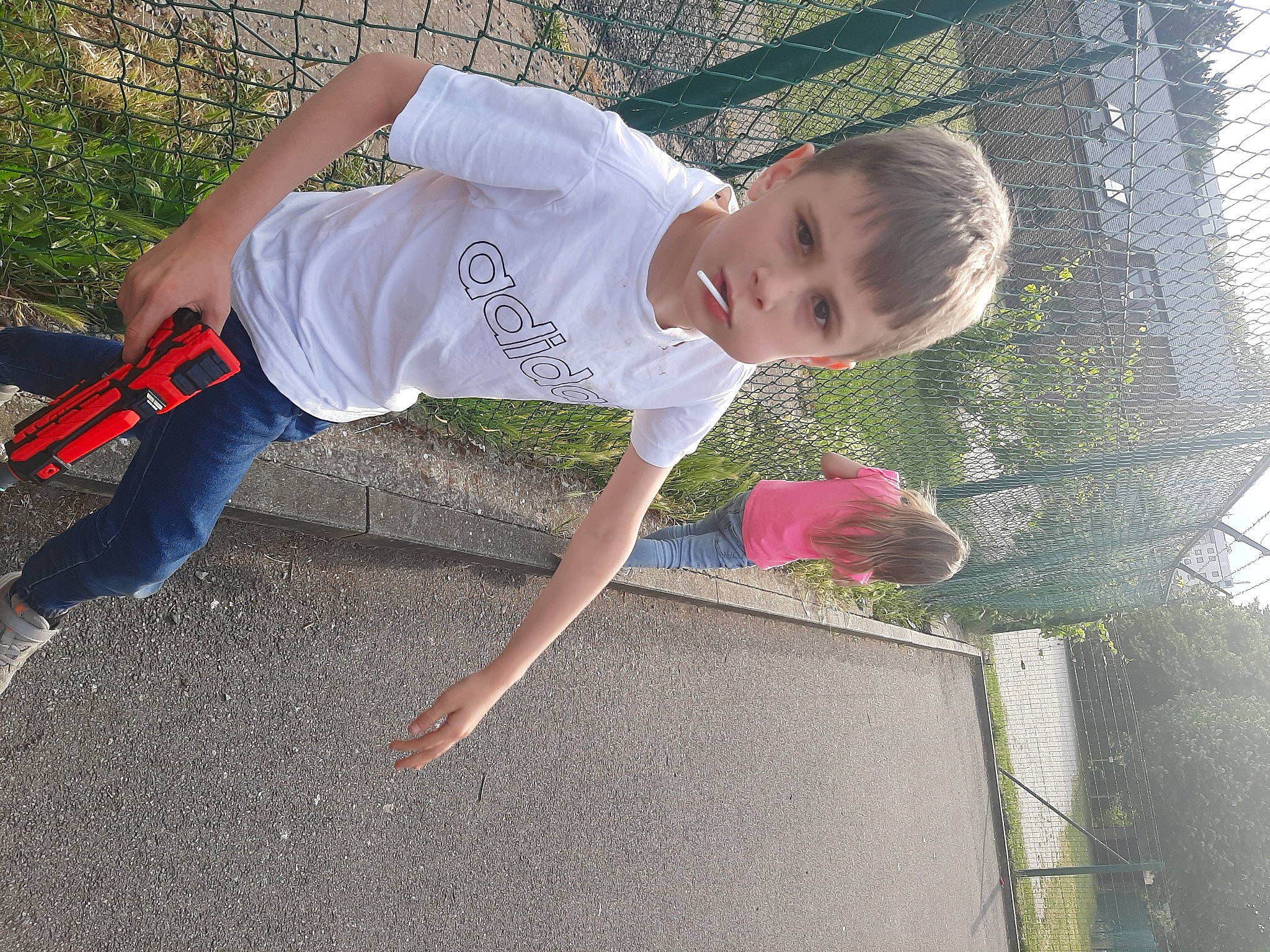 Nathéo participe au concours pour gagner de l'argent avec cette photo : active_pants, asphalt, baby_toddler_clothing, balance, child, concrete, fun, grass, happy, leisure, person, plant, play, recreation, road_surface, shorts, soil, toddler, walking_shoe