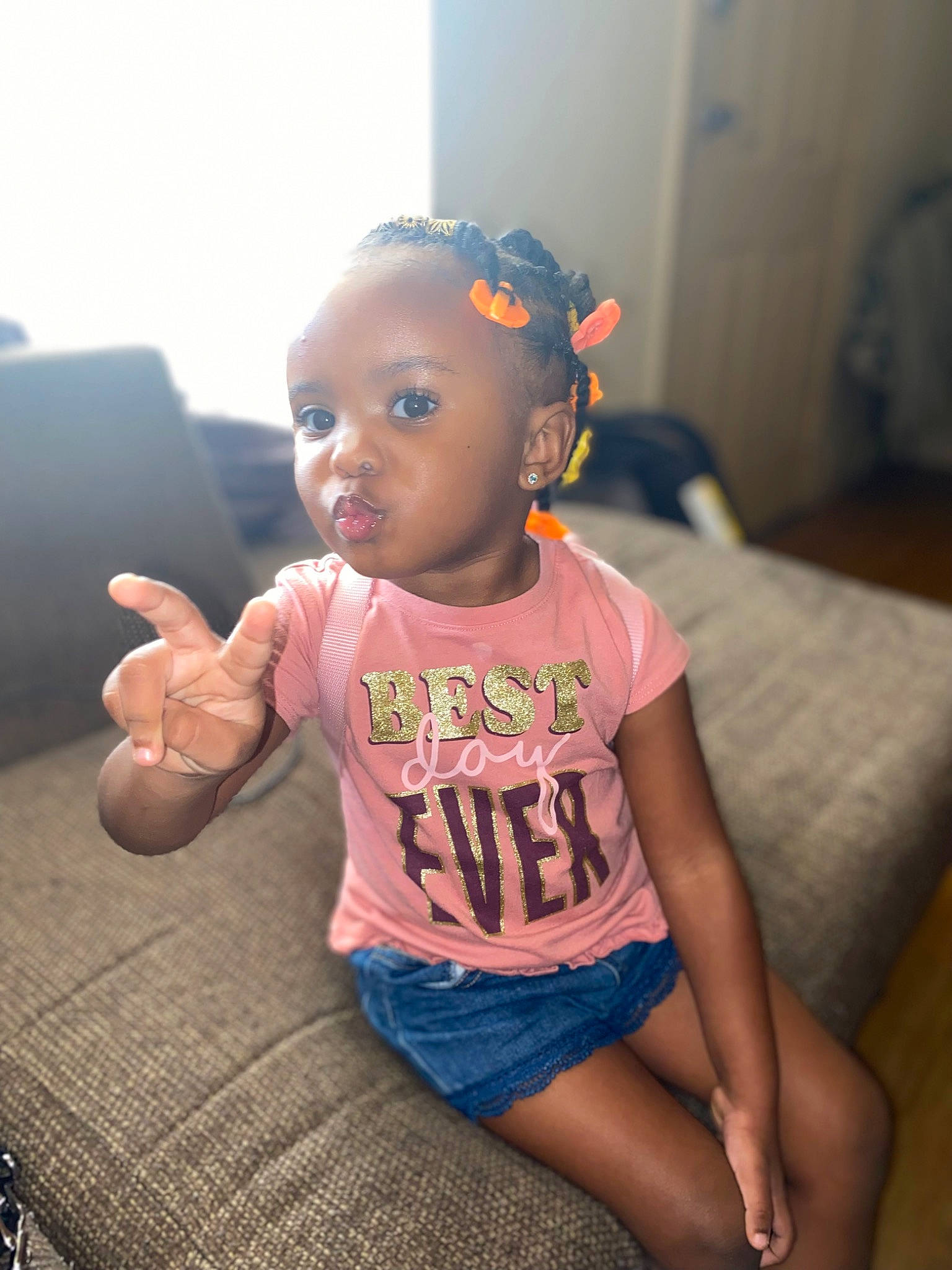 Sariyah joined the competition — help win amazing prizes! arm, baby, baby_toddler_clothing, cheek, child, comfort, cool, couch, flash_photography, flooring, fun, happy, head, person, shorts, sitting, skin, sleeve, t_shirt, thigh