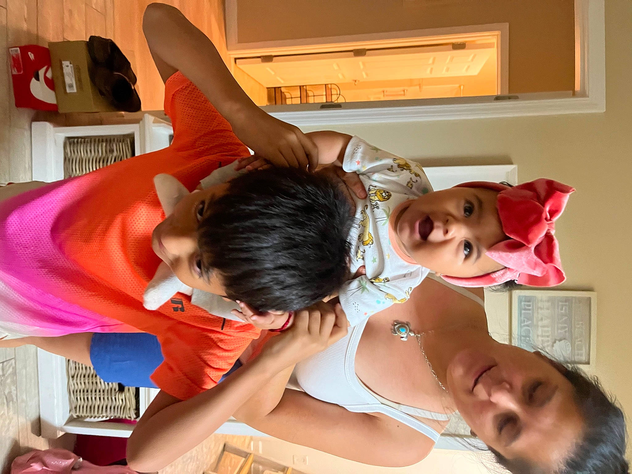 Juliette is registered to the contest to win money with this photo: abdomen, black_hair, chest, child, comfort, elbow, event, eyelash, eyewear, facial_expression, fun, happy, headwear, jewellery, mouth, neck, person, room, selfie, television