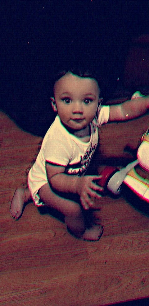 Haizley is registered to the contest to win money with this photo: baby, baby_toddler_clothing, cheek, child, cloud, darkness, finger, flash_photography, flooring, fun, happy, hardwood, human_leg, nose, person, sitting, skin, thumb, tints_and_shades, toddler