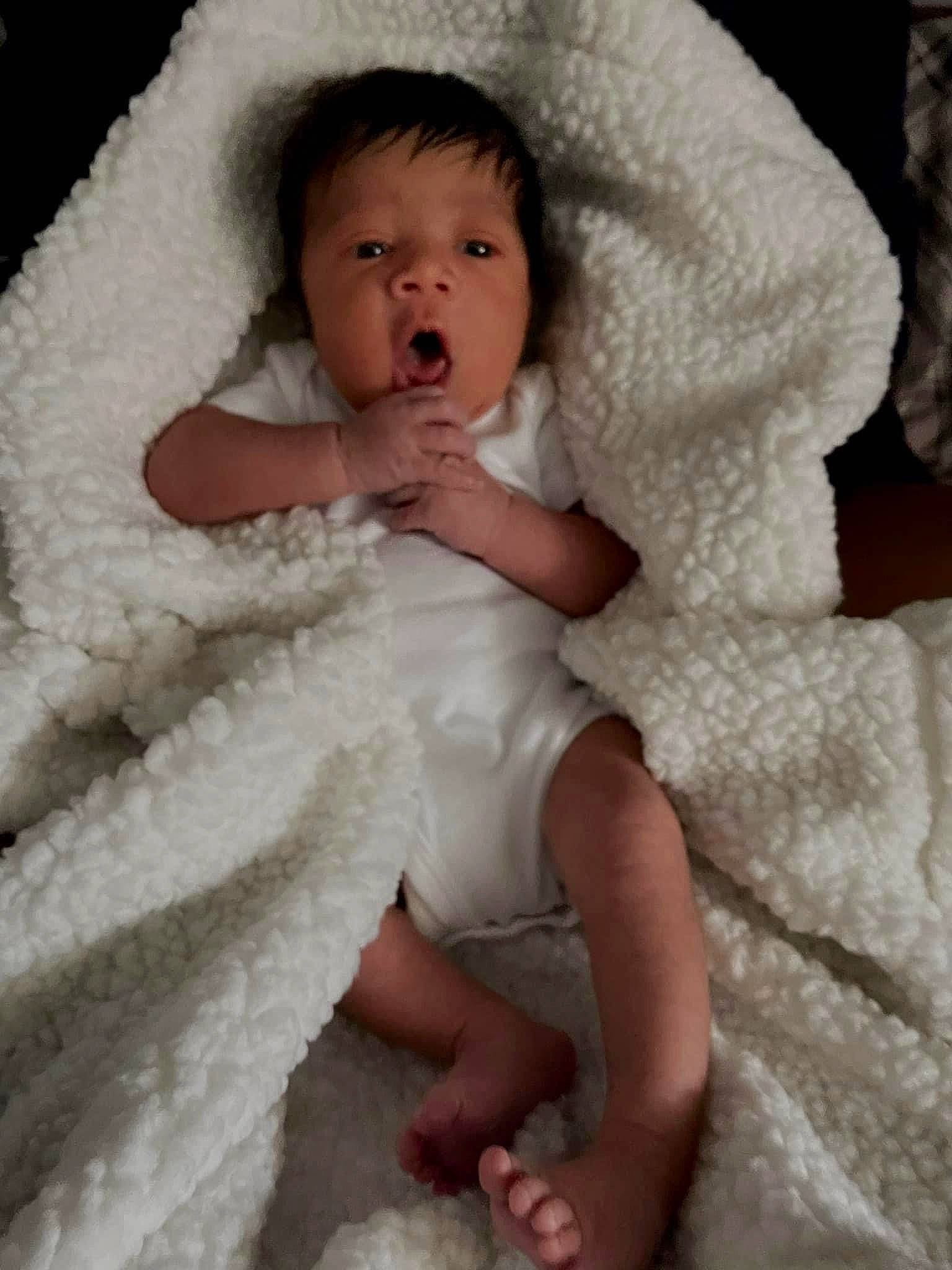 Kacen is registered to the contest to win money with this photo: baby, baby_toddler_clothing, cheek, child, comfort, embellishment, finger, fur, hand, headgear, iris, linens, lip, organ, person, skin, sleeve, textile, toddler, white