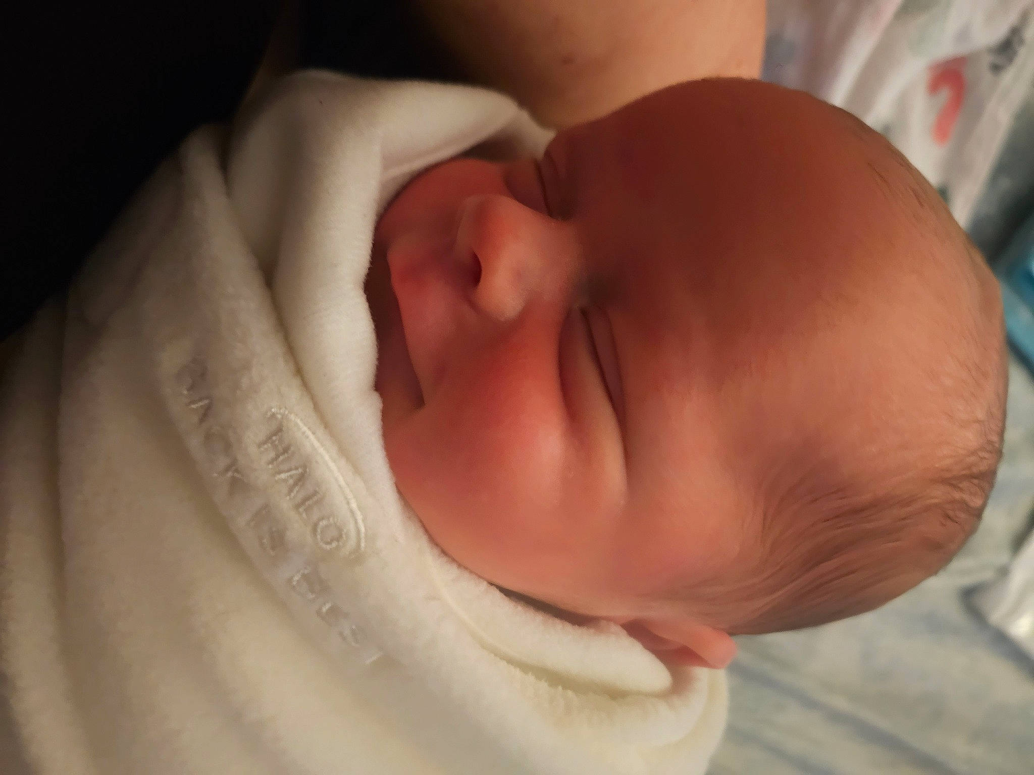 Finyx is registered to the contest to win money with this photo: baby, baby_toddler_clothing, bedtime, cheek, child, childbirth, comfort, ear, eye, eyebrow, eyelash, hand, head, human_body, iris, lip, neck, nose, person, thumb