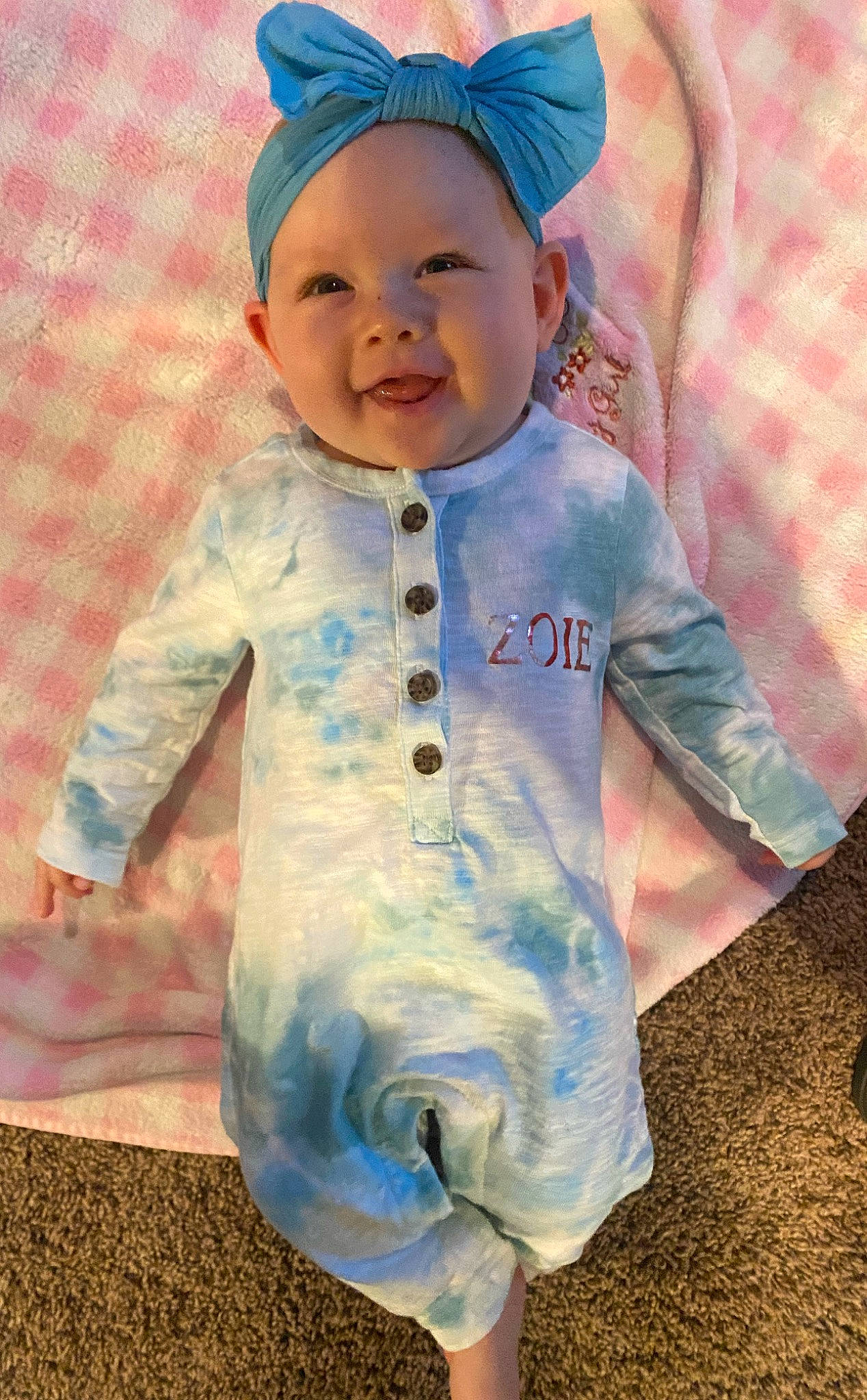 Zoie is registered to the contest to win money with this photo: baby, baby_toddler_clothing, blue, cap, child, cool, electric_blue, eye, face, facial_expression, fun, happy, hat, headwear, human, person, pink, sleeve, smile, standing