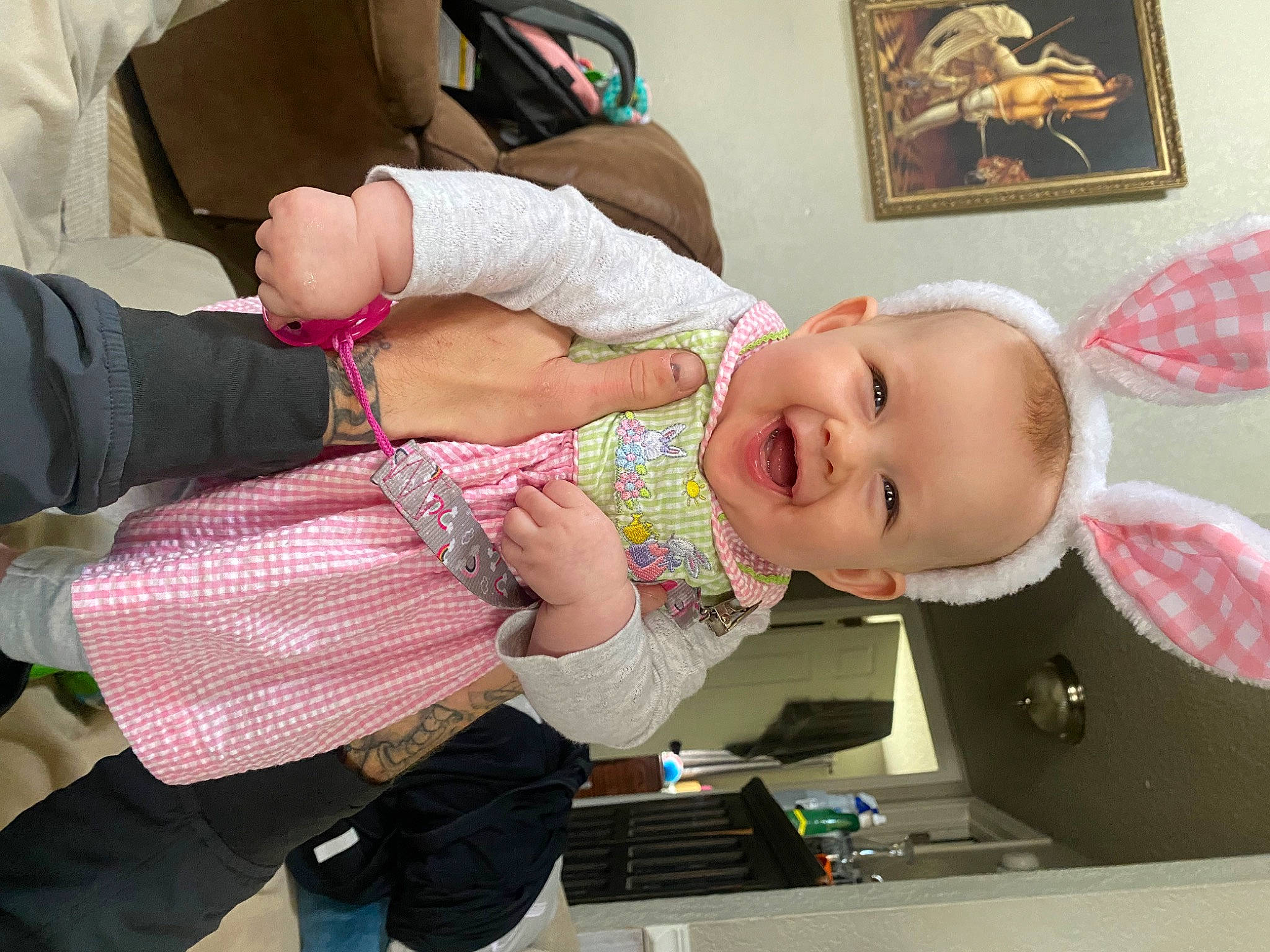 Zoie is registered to the contest to win money with this photo: baby, baby_products, baby_toddler_clothing, child, elbow, finger, fun, happy, hat, joy, pattern, person, picture_frame, room, smile, toddler, wrist