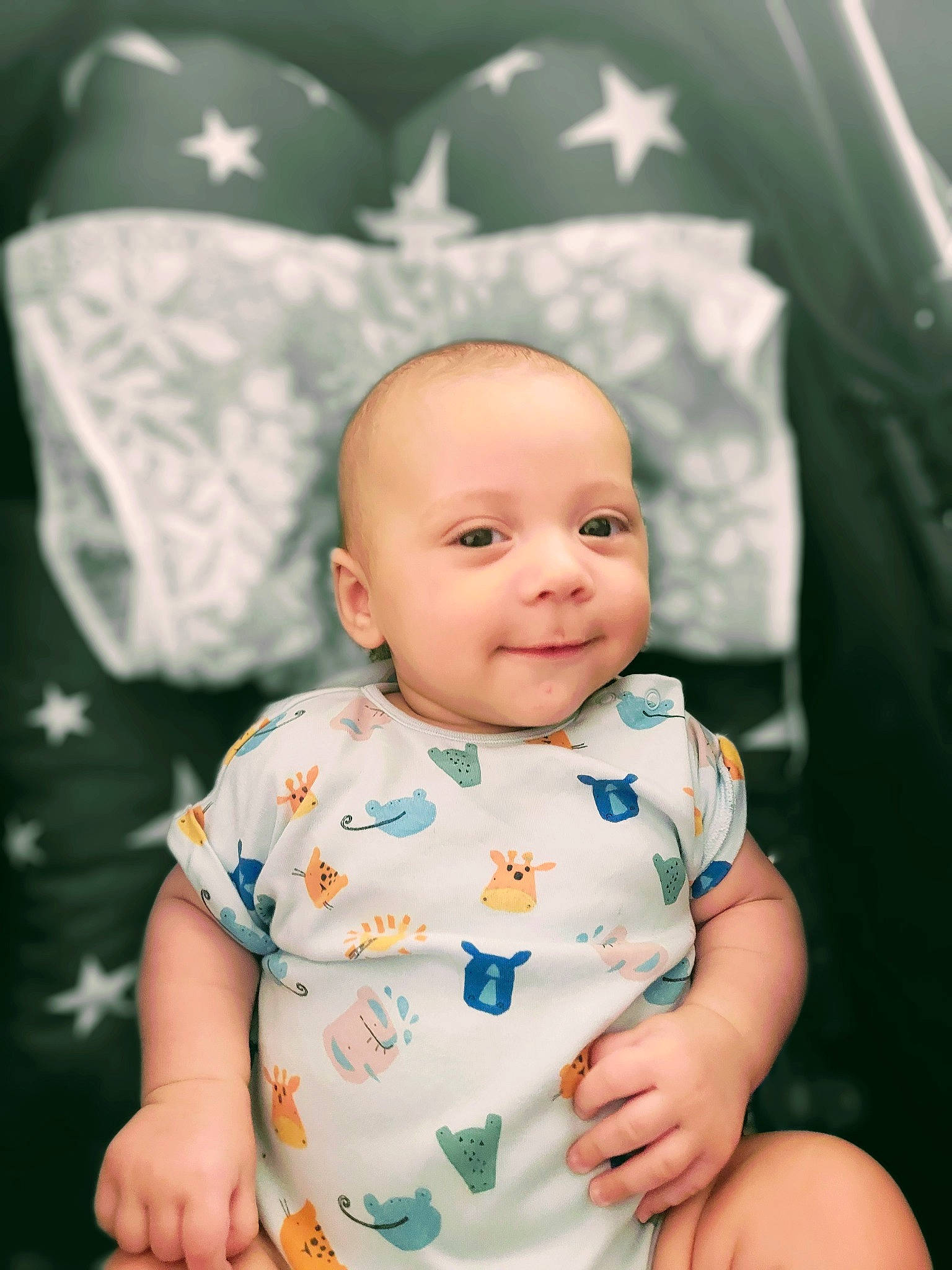 Kane is registered to the contest to win money with this photo: baby, baby_toddler_clothing, cheek, child, eye, flash_photography, fun, grass, happy, joy, pattern, person, portrait, portrait_photography, product, sitting, skin, sleeve, smile, toddler