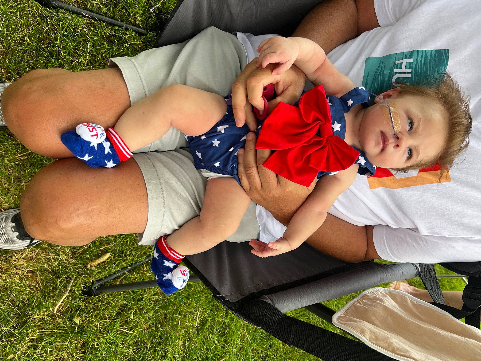 Braylynn joined the competition — help win amazing prizes! abdomen, baby_toddler_clothing, chest, event, fun, grass, happy, human_leg, knee, lap, leg, leisure, person, shorts, smile, sock, sports_uniform, sportswear, thigh, toddler