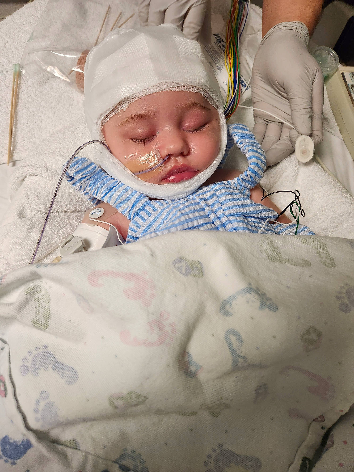 Braylynn is registered to the contest to win money with this photo: baby, baby_products, baby_safety, baby_sleeping, baby_toddler_clothing, bedding, bedtime, cheek, child, comfort, eye, hat, headwear, linens, pattern, person, room, skin, sleeve, textile