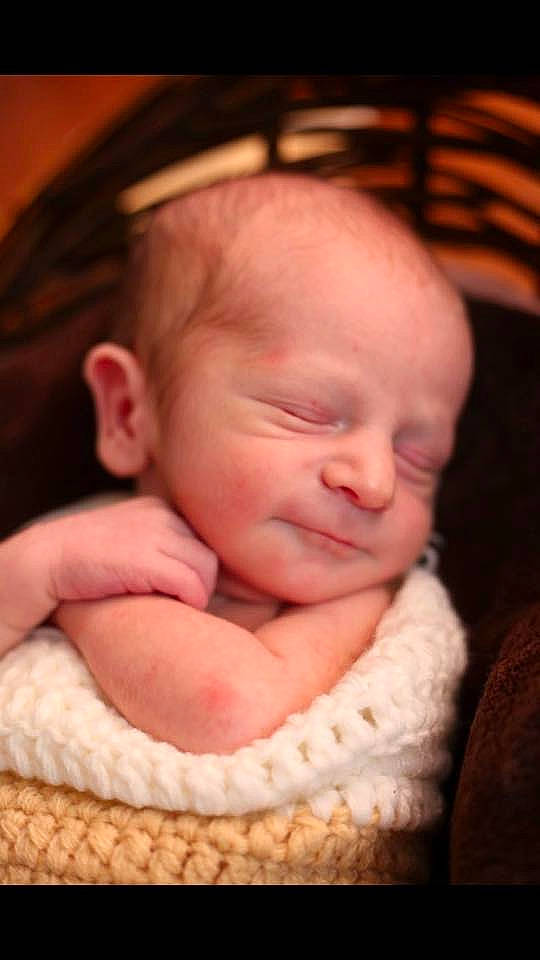 Ridge is registered to the contest to win money with this photo: bedtime, cheek, child, close_up, ear, finger, hand, head, infant, lip, mouth, nap, nose, person, portrait_photography, skin, sleep, smile, toddler