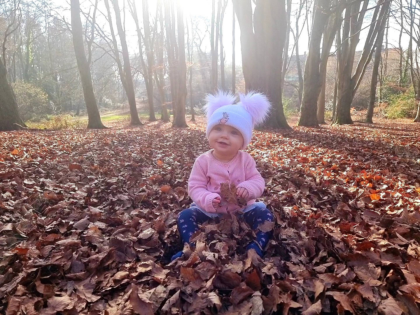 Evie is registered to the contest to win money with this photo: baby, baby_toddler_clothing, beauty, botany, child, deciduous, grass, happy, headwear, joy, leaf, mammal, natural_landscape, people, people_in_nature, person, plant, smile, toddler, tree