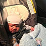 Malakai is registered to the contest to win money with this photo: baby, car_seat, blanket, hat, pacifier, bottle, sleeping, child, infant, clothing, baby_bottle, soft, cute, closeup, indoors, seatbelt, resting, newborn, cozy, baby_accessories