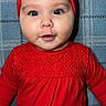 Nelsy joined the competition — help win amazing prizes! baby, child, infant, portrait, red_outfit, headband, flower, smiling, wide_eyes, face, indoors, blanket, blue_background, sitting, reclining, clothing, cute, photography, close_up, safe