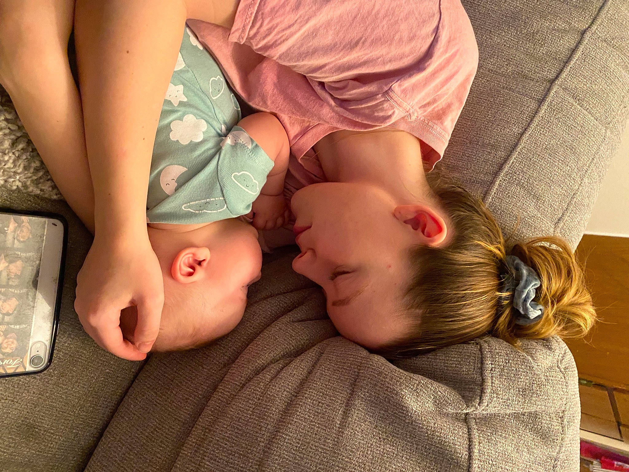 Tory is registered to the contest to win money with this photo: arm, baby, chest, comfort, eyelash, facial_expression, finger, gesture, glasses, hand, human_body, joint, leg, mouth, muscle, neck, person, shoulder, skin, stomach