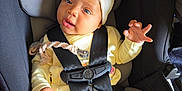Ur'Majesty joined the competition — help win amazing prizes! adorable, baby, blue_eyes, car_seat, child, clothing, comfort, cute, expression, hand, headband, indoor, infant, light, pajamas, person, safety_harness, seat, seatbelt, young_child