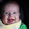 Theodore joined the competition — help win amazing prizes! baby, smiling, blue_eyes, yellow_bib, green_shirt, face, closeup, portrait, child, happy, infant, cute, cheerful, clothing, skin, mouth_open, tongue, indoor, person, head