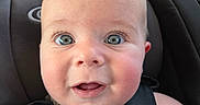 Theodore is registered to the contest to win money with this photo: baby, child, car_seat, seatbelt, close_up, portrait, infant, smiling, happy, cute, face, eyes, skin, straps, car_interior, headrest, real_photo, daylight, casual, young_child