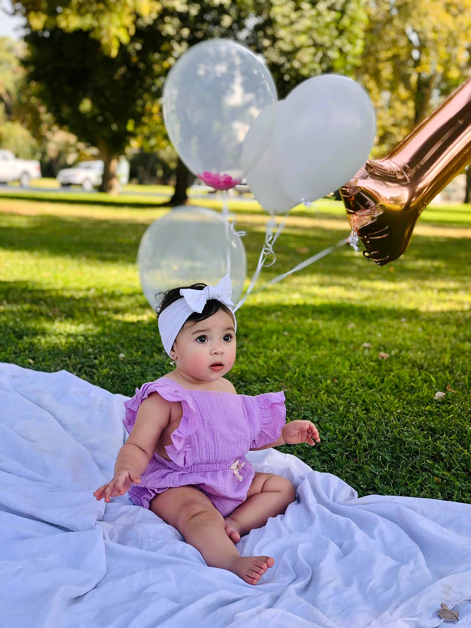 Ariella is registered to the contest to win money with this photo: balloon, dress, facial_expression, fun, grass, happy, headwear, human_body, leisure, light, magenta, nature, people_in_nature, person, photograph, pink, plant, purple, recreation, summer