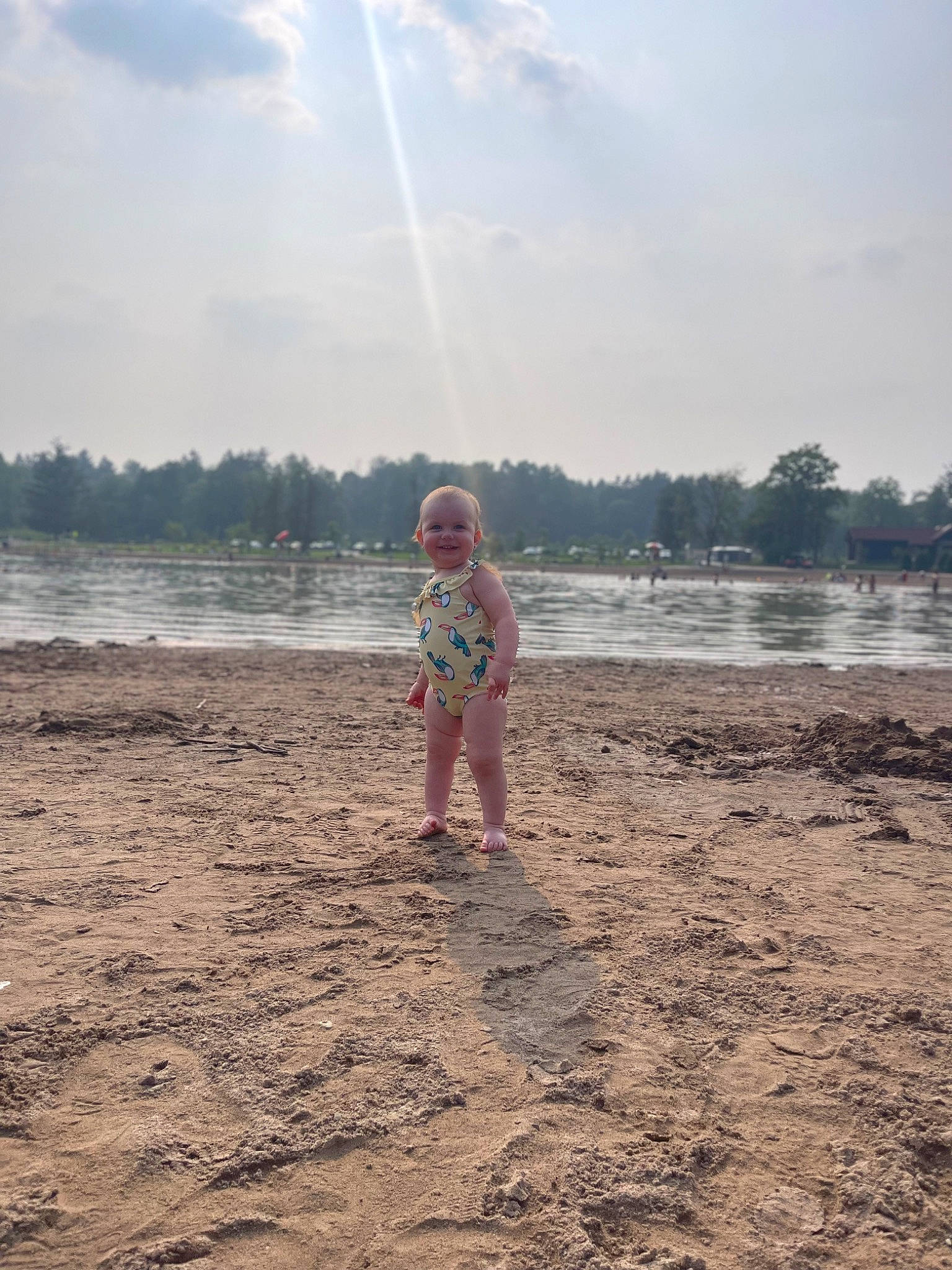 Brynlee joined the competition — help win amazing prizes! bank, beach, calm, cloud, coastal_and_oceanic_landforms, fun, happy, horizon, joy, lake, landscape, people_in_nature, people_on_beach, person, sky, summer, sunlight, tree, water, water_resources