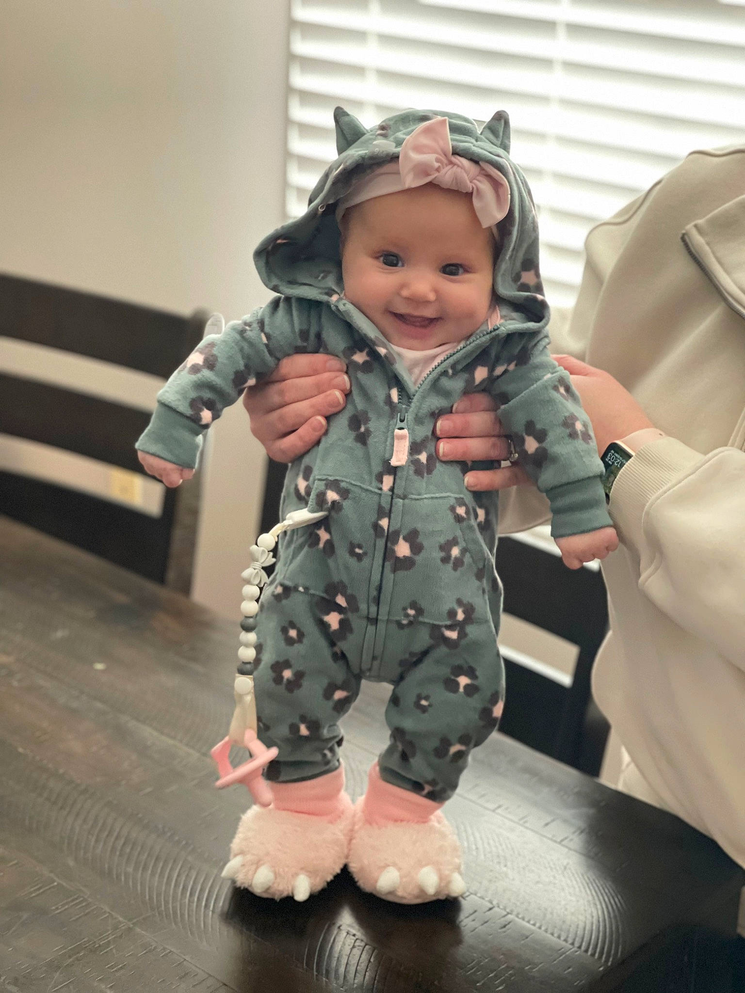 Brooklynn is registered to the contest to win money with this photo: baby, baby_toddler_clothing, cheek, costume, eye, fashion_design, finger, flooring, fun, gesture, head, headwear, joint, joy, outerwear, person, personal_protective_equipment, skin, sleeve, smile
