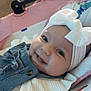 Ambre participe au concours pour gagner de l'argent avec cette photo : baby, infant, smiling, headband, bow, cheeks, eyes, closeup, portrait, denim, overalls, buttons, baby_seat, blanket, pink, clothing, adorable, indoor, soft_lighting, happy