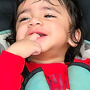 Badri joined the competition — help win amazing prizes! baby, cheerful, child, closeup, cute, eyes, face, hair, hand, happy, harness, indoors, laughing, person, portrait, red_shirt, seat, skin, smiling, toddler