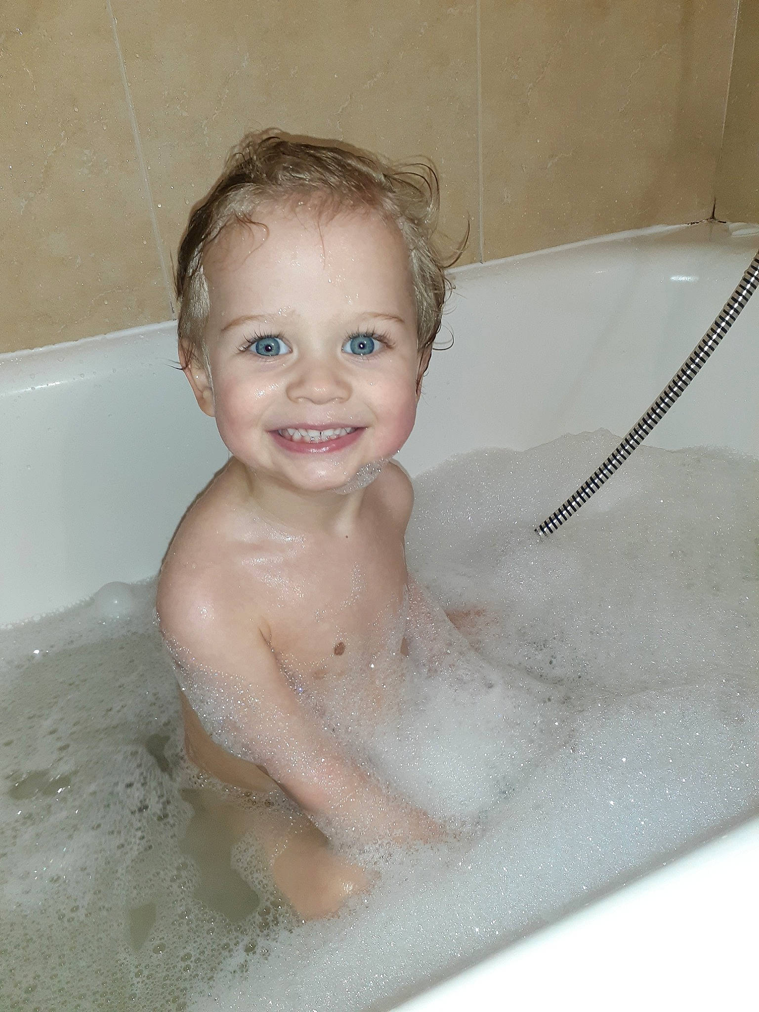 Spencer joined the competition — help win amazing prizes! baby_bathing, bathing, bathtub, child, face, foam, fun, joy, person, plumbing_fixture, room, skin, smile, washing