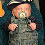 William a rejoint le concours — aidez-le/la à gagner de superbes lots ! baby, baby_clothes, blanket, blue, clothing, comfort, cute, denim_overalls, fabric, face, hand, indoor, infant, lying_down, pacifier, person, plush_toy, portrait, soft_toy, striped_cap