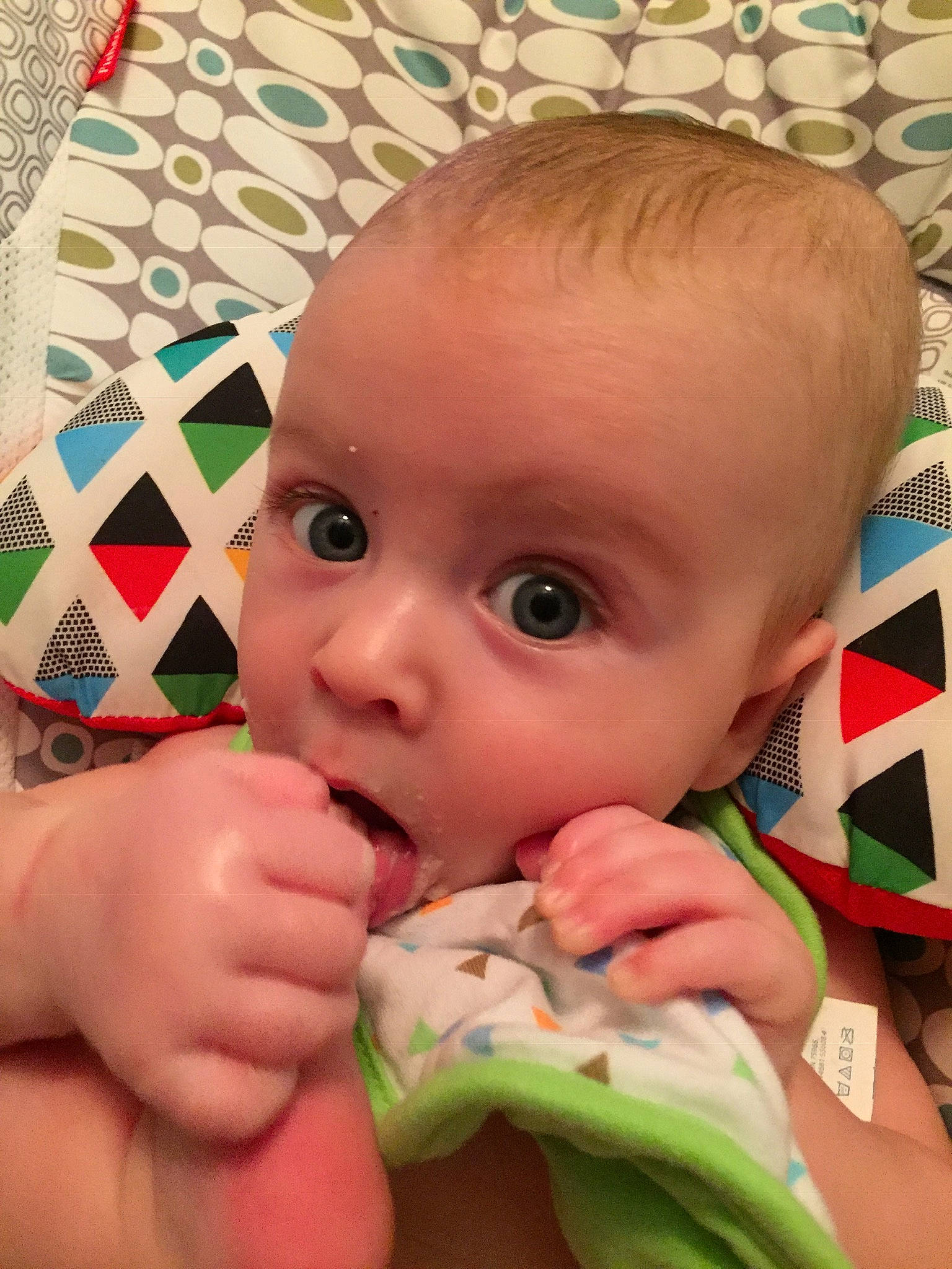 Lachlan is registered to the contest to win money with this photo: boy, cheek, child, chin, ear, eating, eye, face, finger, forehead, hand, head, infant, lip, mouth, nail, nose, person, play, skin