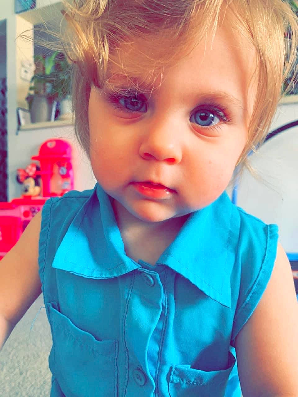 Paisley is registered to the contest to win money with this photo: baby_toddler_clothing, blue, cheek, cool, ear, eyelash, hair, hairstyle, happy, iris, lip, mouth, neck, nose, person, pink, shoulder, skin, sleeve, standing